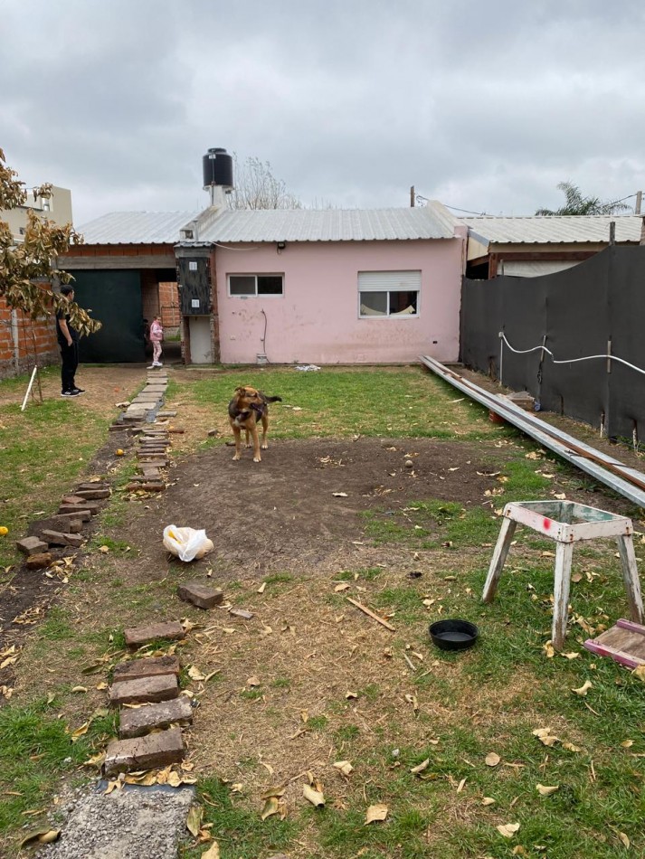 CASA 2 DORMITORIOS COCHERA Y QUINCHO