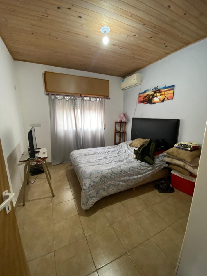 CASA 2 DORMITORIOS COCHERA Y QUINCHO